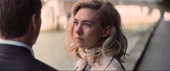 Movie still from “Mission: Impossible - Fallout” (2018), directed by Christopher McQuarrie – A woman with blonde hair and blue eyes looking to her left; Close Up shot, Low angle