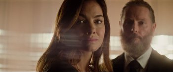 Movie still from “Mission: Impossible - Fallout” (2018), directed by Christopher McQuarrie – A person with long hair; Close Up shot, Low angle