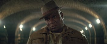 Movie still from “Mission: Impossible - Fallout” (2018), directed by Christopher McQuarrie – A person wearing a hat and a jacket; Close Up shot, Low angle