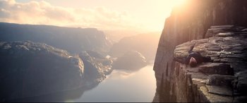 Movie still from “Mission: Impossible - Fallout” (2018), directed by Christopher McQuarrie – A man is climbing a cliff on a mountain top; Extreme Wide shot, Low angle