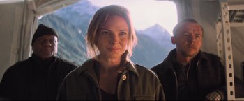 Movie still from “Mission: Impossible - Fallout” (2018), directed by Christopher McQuarrie – A person wearing a jacket with mountains in the background; Close Up shot, Over the shoulder angle