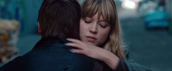 Movie still from “Mission: Impossible - Ghost Protocol” (2011), directed by Brad Bird – A woman hugging a man in a leather jacket; Close Up shot, Over the shoulder angle
