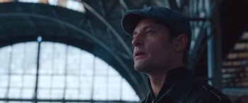 Movie still from “Mission: Impossible - Ghost Protocol” (2011), directed by Brad Bird – A person wearing a hat; Close Up shot, Low angle