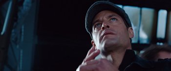 Movie still from “Mission: Impossible - Ghost Protocol” (2011), directed by Brad Bird – A person wearing a hat; Close Up shot, Low angle