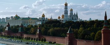 Movie still from “Mission: Impossible - Ghost Protocol” (2011), directed by Brad Bird – A view of a city with a castle like building in the background; Extreme Wide shot, High angle