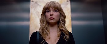 Movie still from “Mission: Impossible - Ghost Protocol” (2011), directed by Brad Bird – A beautiful young woman with long , blonde hair; Close Up shot, Low angle