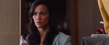 Movie still from “Mission: Impossible - Ghost Protocol” (2011), directed by Brad Bird – A person with long hair; Close Up shot, Over the shoulder angle