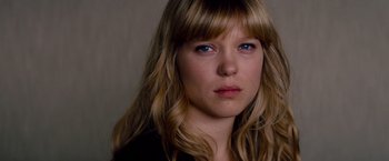 Movie still from “Mission: Impossible - Ghost Protocol” (2011), directed by Brad Bird – A person with long blonde hair; Close Up shot, Over the shoulder angle
