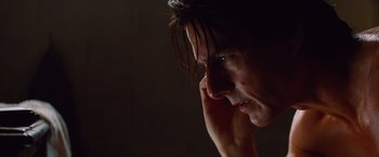 Movie still from “Mission: Impossible - Ghost Protocol” (2011), directed by Brad Bird – A man's face in the dark; Close Up shot, Over the shoulder angle