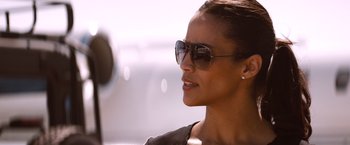 Movie still from “Mission: Impossible - Ghost Protocol” (2011), directed by Brad Bird – A person wearing sunglasses; Close Up shot, Over the shoulder angle