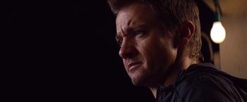 Movie still from “Mission: Impossible - Ghost Protocol” (2011), directed by Brad Bird – A man's face in the dark; Close Up shot, Low angle