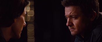 Movie still from “Mission: Impossible - Ghost Protocol” (2011), directed by Brad Bird – A man's face in a dark room; Close Up shot, Over the shoulder angle