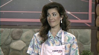 Movie still from “Oats Studios” (2017), directed by Neill Blomkamp – A woman wearing an apron standing in front of a wall; Close Up shot, High angle