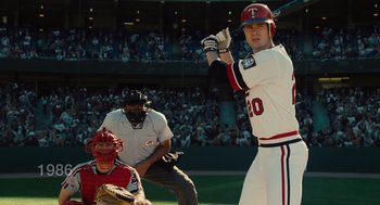 Movie still from “Moneyball” (2011), directed by Bennett Miller – A baseball player is getting ready to hit a ball; Medium shot, Over the shoulder angle