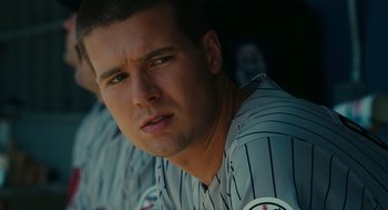 Movie still from “Moneyball” (2011), directed by Bennett Miller – A baseball player in a dugout; Close Up shot, Over the shoulder angle