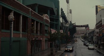 Movie still from “Moneyball” (2011), directed by Bennett Miller – A car is parked on the side of the street; Extreme Wide shot, High angle