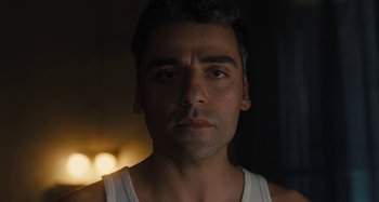 Movie still from “Operation Finale” (2018), directed by Chris Weitz – A person wearing a white shirt; Close Up shot, Low angle