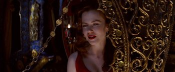 Movie still from “Moulin Rouge!” (2001), directed by Baz Luhrmann – A woman with red lipstick looking into a mirror; Close Up shot, Over the shoulder angle