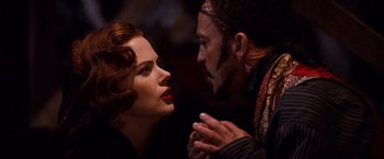 Movie still from “Moulin Rouge!” (2001), directed by Baz Luhrmann – A man and a woman face to face in front of each other; Close Up shot, Over the shoulder angle