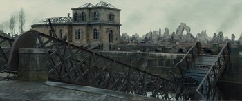 Movie still from “1917” (2019), directed by Sam Mendes – An old building in the middle of a destroyed city; Extreme Wide shot, High angle