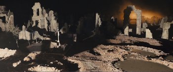Movie still from “1917” (2019), directed by Sam Mendes – A view of a building that has been destroyed; Extreme Wide shot, High angle