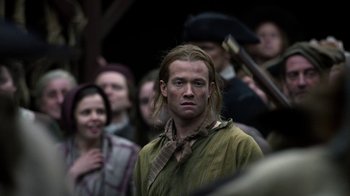 Movie still from “Outlander” (2014), created by Ronald D. Moore – Medium shot, Over the shoulder angle