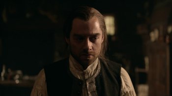 Movie still from “Outlander” (2014), created by Ronald D. Moore – A person with long hair; Close Up shot, Over the shoulder angle