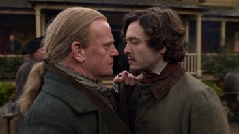 Movie still from “Outlander” (2014), created by Ronald D. Moore – Close Up shot, Over the shoulder angle