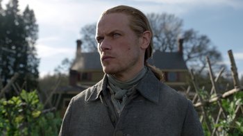 Movie still from “Outlander” (2014), created by Ronald D. Moore – A person with long blonde hair; Close Up shot, Over the shoulder angle