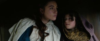 Movie still from “Outlaw King” (2018), directed by David Mackenzie – Two young girls are looking into the distance; Close Up shot, Low angle