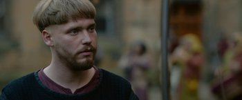 Movie still from “Outlaw King” (2018), directed by David Mackenzie – A person with a beard; Close Up shot, Over the shoulder angle