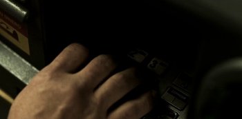 Movie still from “Ozark” (2017), created by Bill Dubuque – A hand on a computer keyboard in the dark; Extreme Close Up shot, High angle