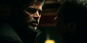 Movie still from “Ozark” (2017), created by Bill Dubuque – A man in a black jacket is talking to another man in a black jacket; Close Up shot, Over the shoulder angle