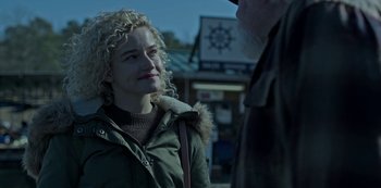 Movie still from “Ozark” (2017), created by Bill Dubuque – A woman with blonde curly hair is talking to an older man; Close Up shot, Over the shoulder angle
