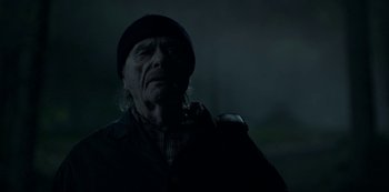 Movie still from “Ozark” (2017), created by Bill Dubuque – An old man in a black hat and jacket; Close Up shot, Low angle