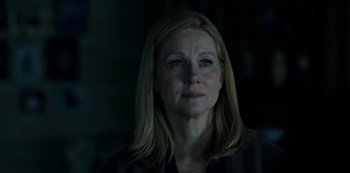 Movie still from “Ozark” (2017), created by Bill Dubuque – A person wearing a black shirt; Close Up shot, Over the shoulder angle