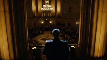 Movie still from “Mr. Robot” (2015), created by Sam Esmail – A man standing in front of an audience in a building; Extreme Wide shot, High angle