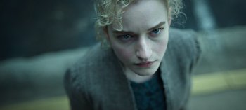 Movie still from “Ozark” (2017), created by Bill Dubuque – A person with curly blonde hair; Close Up shot, Low angle