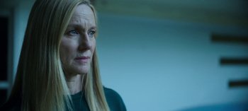 Movie still from “Ozark” (2017), created by Bill Dubuque – A person with long blonde hair; Close Up shot, Low angle