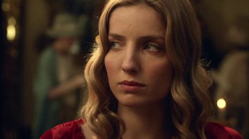 Movie still from “Peaky Blinders” (2013), created by Steven Knight – A person with long hair; Close Up shot, Over the shoulder angle