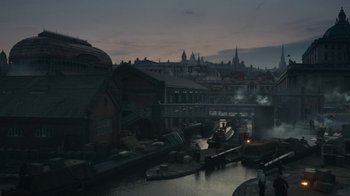 Movie still from “Peaky Blinders” (2013), created by Steven Knight – An image of a city with a river in the middle of it; Extreme Wide shot, High angle