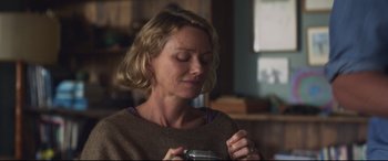 Movie still from “Penguin Bloom” (2020), directed by Glendyn Ivin – A person holding a cup of coffee; Close Up shot, Over the shoulder angle