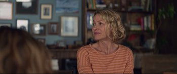 Movie still from “Penguin Bloom” (2020), directed by Glendyn Ivin – A woman sitting in front of a window looking up at the sky; Close Up shot, Over the shoulder angle