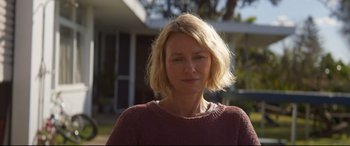 Movie still from “Penguin Bloom” (2020), directed by Glendyn Ivin – A woman with blonde hair is wearing a sweater; Close Up shot, Low angle