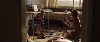 Movie still from “Penguin Bloom” (2020), directed by Glendyn Ivin – A person taking a picture of a room; Wide shot, High angle