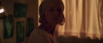 Movie still from “Penguin Bloom” (2020), directed by Glendyn Ivin – A person wearing a sweater and a hat; Close Up shot, Over the shoulder angle