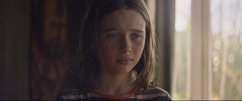 Movie still from “Penguin Bloom” (2020), directed by Glendyn Ivin – A young girl with long hair; Close Up shot, Low angle