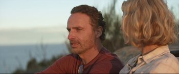 Movie still from “Penguin Bloom” (2020), directed by Glendyn Ivin – A person sitting on a chair; Close Up shot, Over the shoulder angle