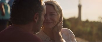 Movie still from “Penguin Bloom” (2020), directed by Glendyn Ivin – A man and a woman smiling at each other; Close Up shot, Over the shoulder angle