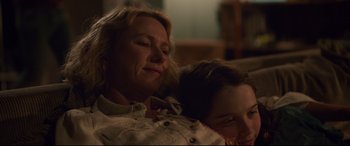 Movie still from “Penguin Bloom” (2020), directed by Glendyn Ivin – A woman and a child laying on a couch; Close Up shot, Over the shoulder angle